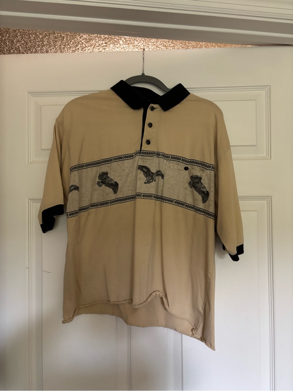 Vintage Beige Polo with Black Collar and Duck Motif